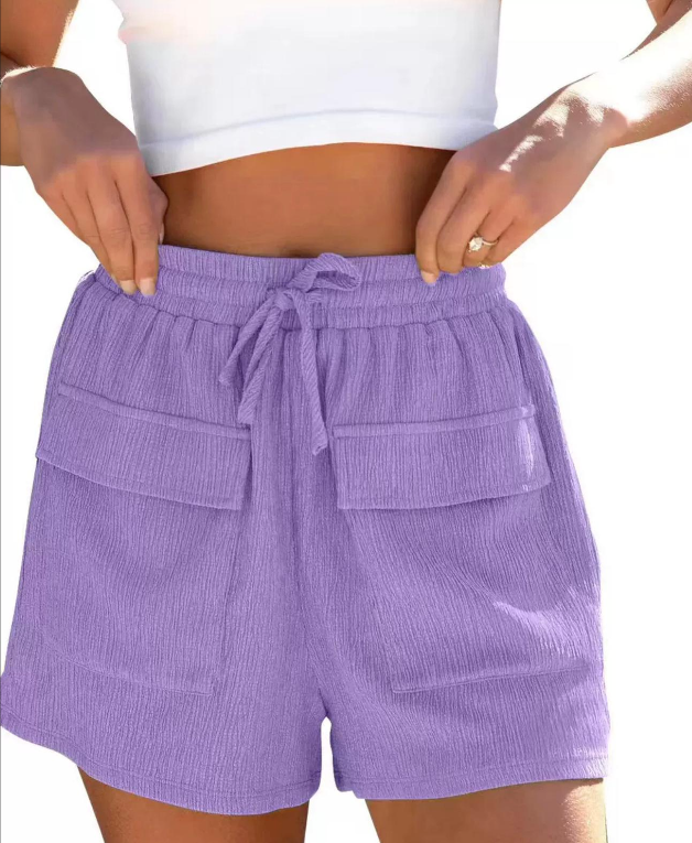 Short taille haute à taille élastique et poches pratiques
